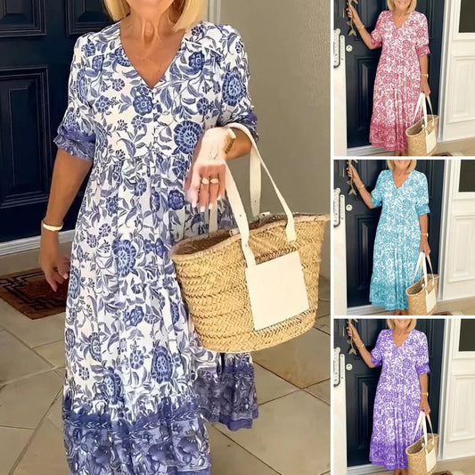 💃【S-3XL】2025 új elegáns virágos hosszú ruha V-nyakkal.