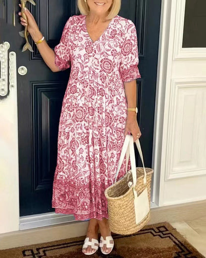 💃【S-3XL】2025 új elegáns virágos hosszú ruha V-nyakkal.